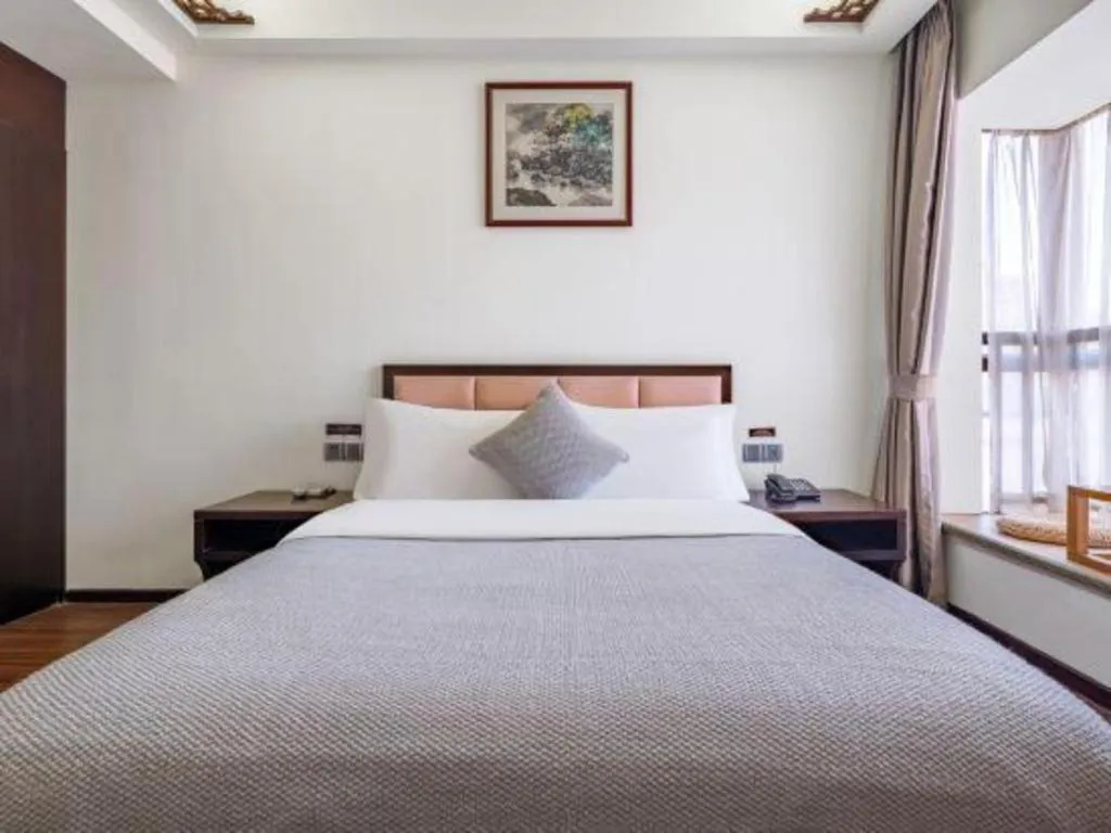 Bed in Oriental Hotel