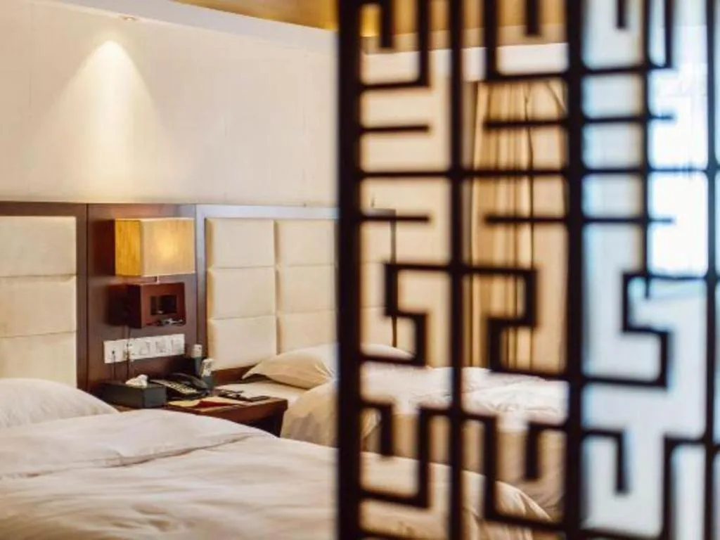 Bed in Oriental Hotel