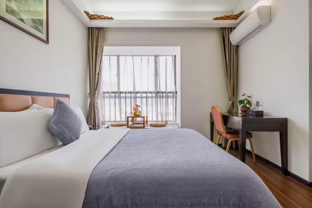 Bed in Oriental Hotel