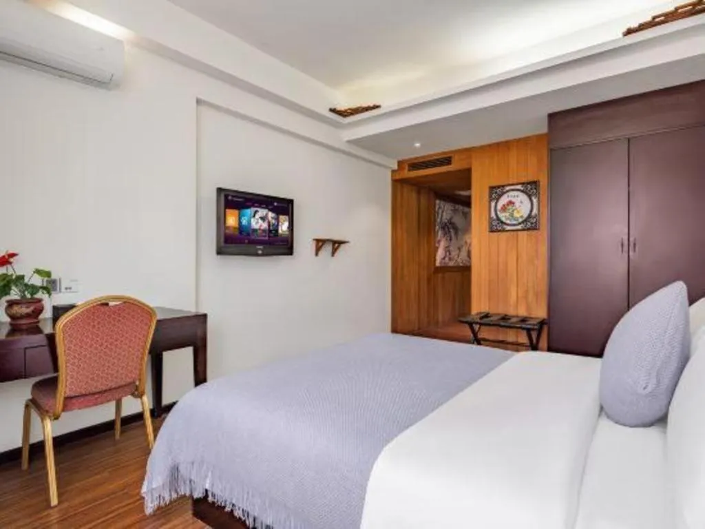 Bed in Oriental Hotel