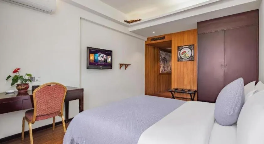 Bed in Oriental Hotel