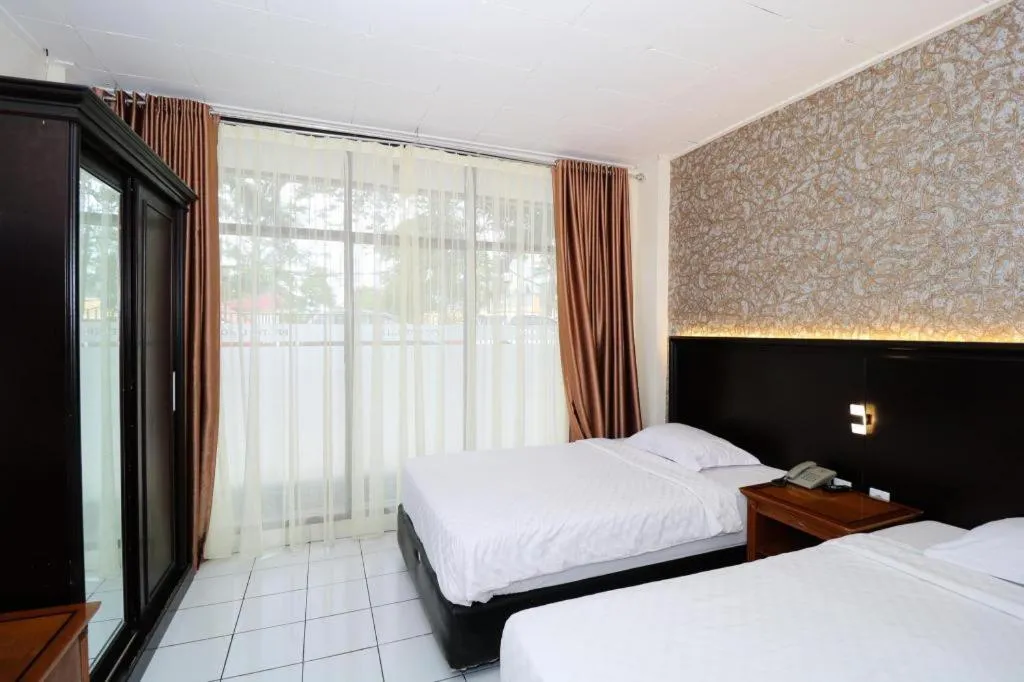 Bed in Hotel Benteng