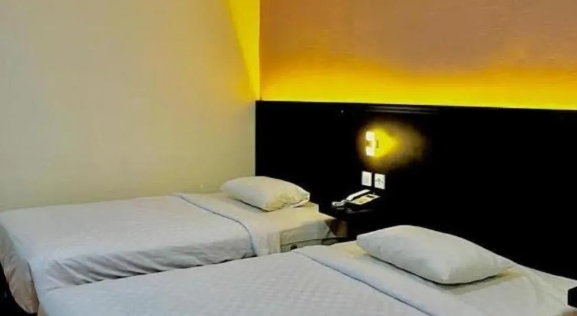 Bed in Hotel Benteng