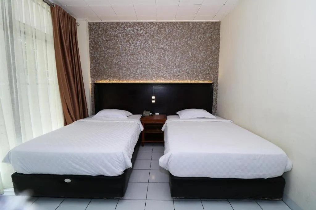 Bed in Hotel Benteng