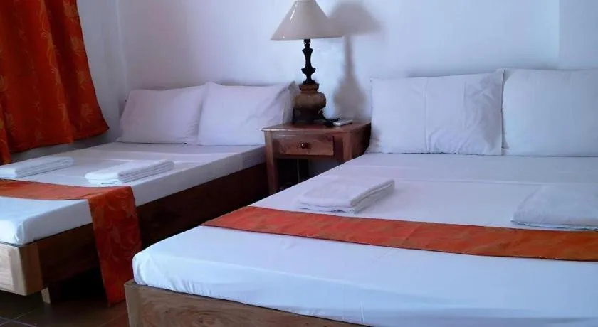 Bed in Anda de Boracay in Bohol Hotel