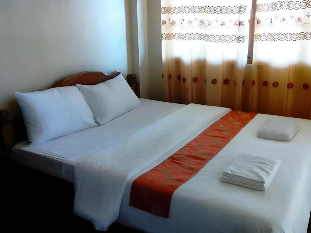 Bed in Anda de Boracay in Bohol Hotel