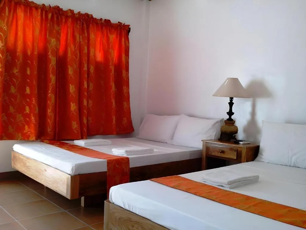 Bed in Anda de Boracay in Bohol Hotel