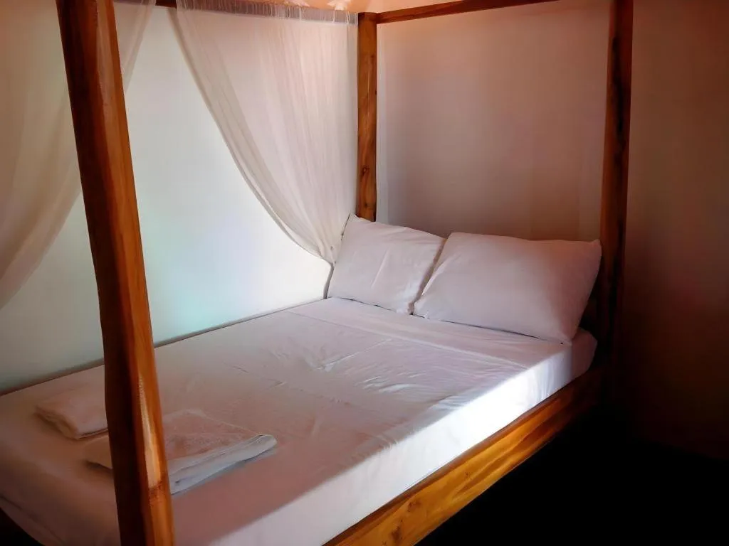 Bed in Anda de Boracay in Bohol Hotel