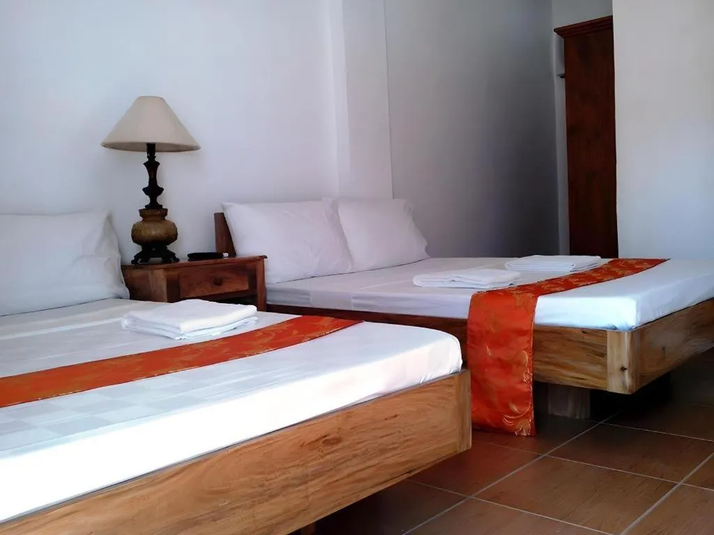 Bed in Anda de Boracay in Bohol Hotel