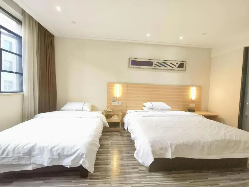 Bed in City Comfort Inn Enshi Shizhou Avenue