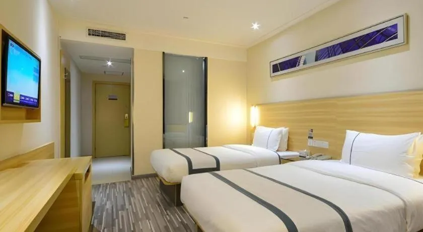 Bed in City Comfort Inn Enshi Shizhou Avenue
