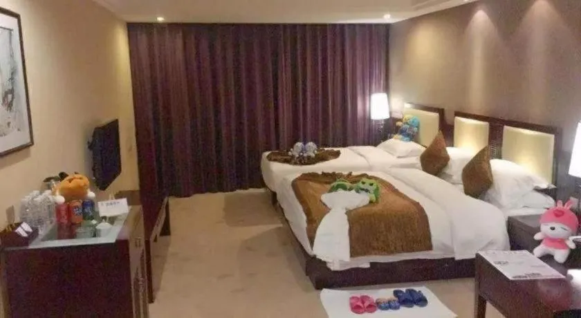 Bed in Kunming Wenhui Hotel