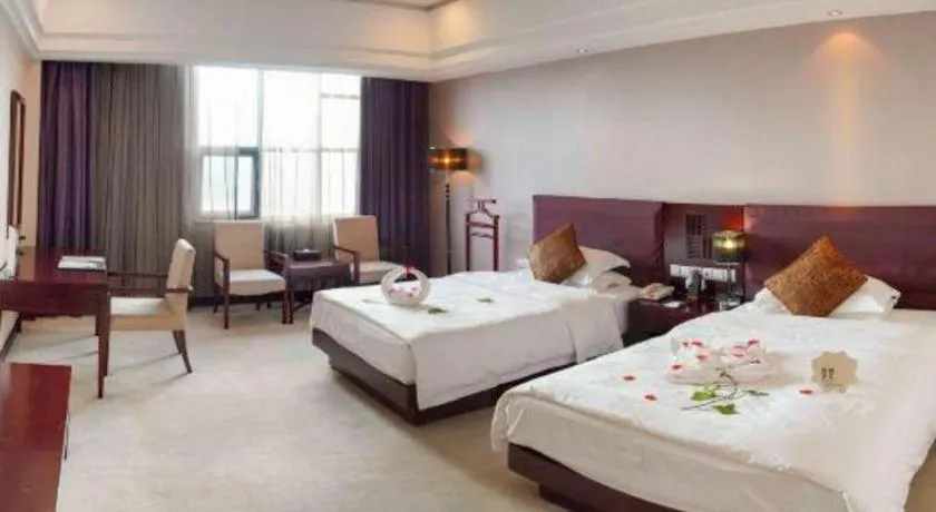 Bed in Kunming Wenhui Hotel