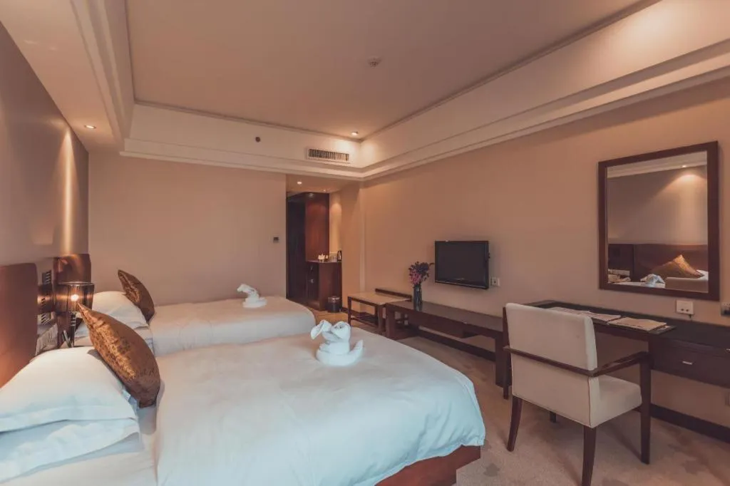 Bed in Kunming Wenhui Hotel