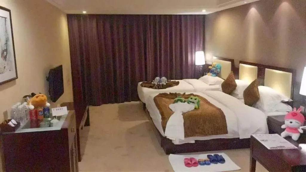 Bed in Kunming Wenhui Hotel