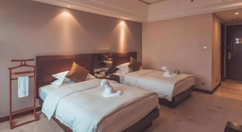 Bed in Kunming Wenhui Hotel