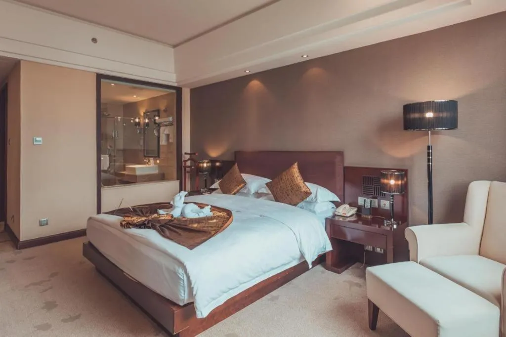 Bed in Kunming Wenhui Hotel