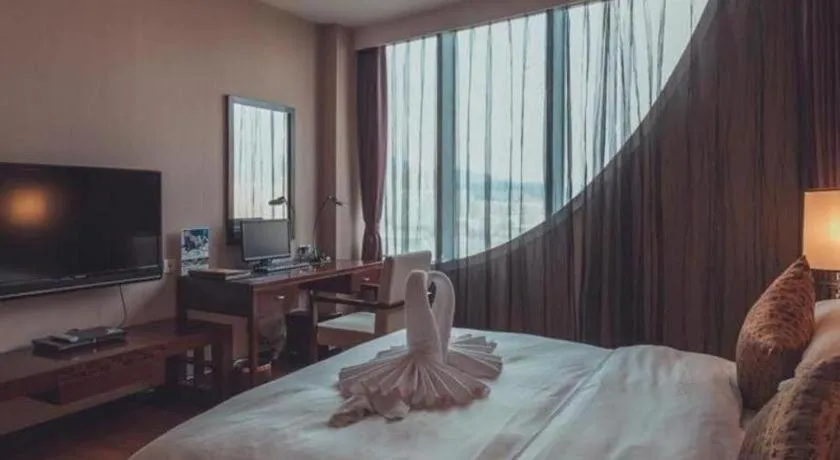 Bed in Kunming Wenhui Hotel