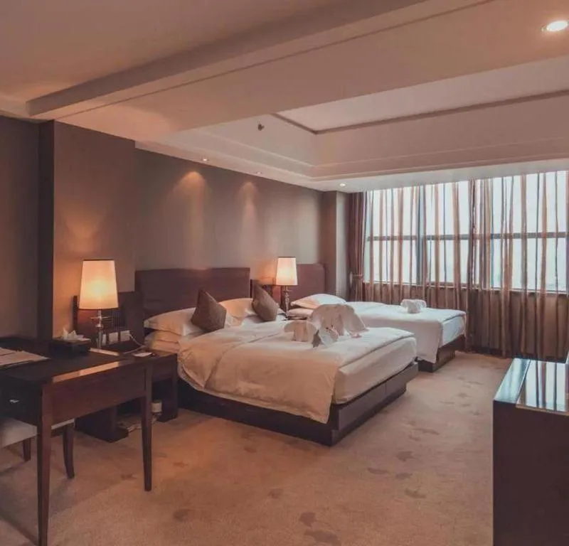 Bed in Kunming Wenhui Hotel