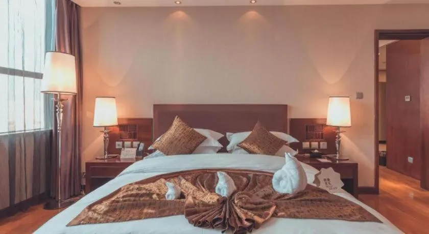 Bed in Kunming Wenhui Hotel