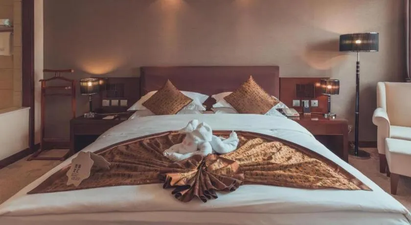 Bed in Kunming Wenhui Hotel