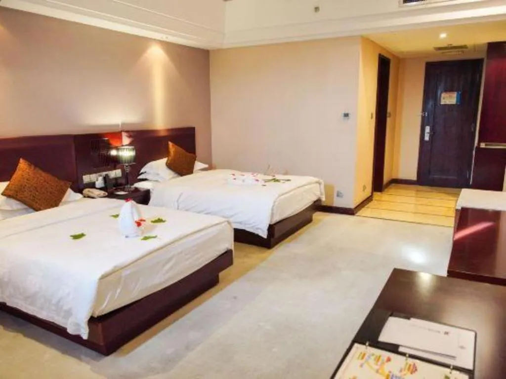 Bed in Kunming Wenhui Hotel