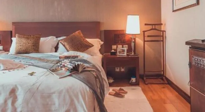 Bed in Kunming Wenhui Hotel