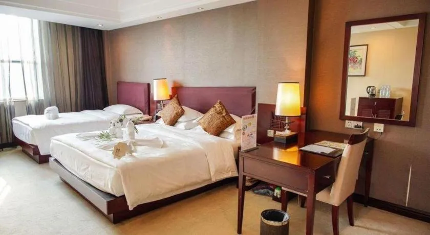 Bed in Kunming Wenhui Hotel