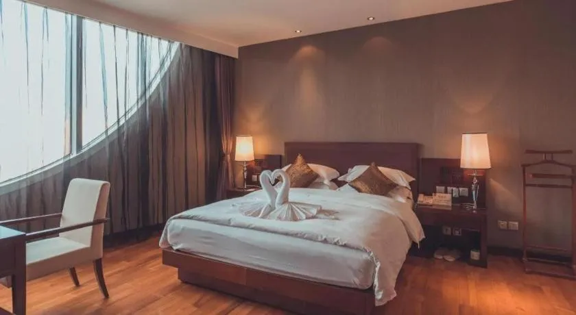 Bed in Kunming Wenhui Hotel