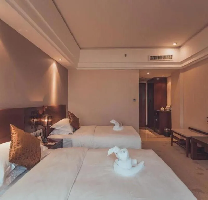 Bed in Kunming Wenhui Hotel