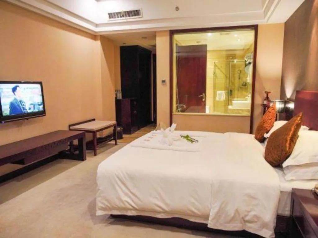 Bed in Kunming Wenhui Hotel