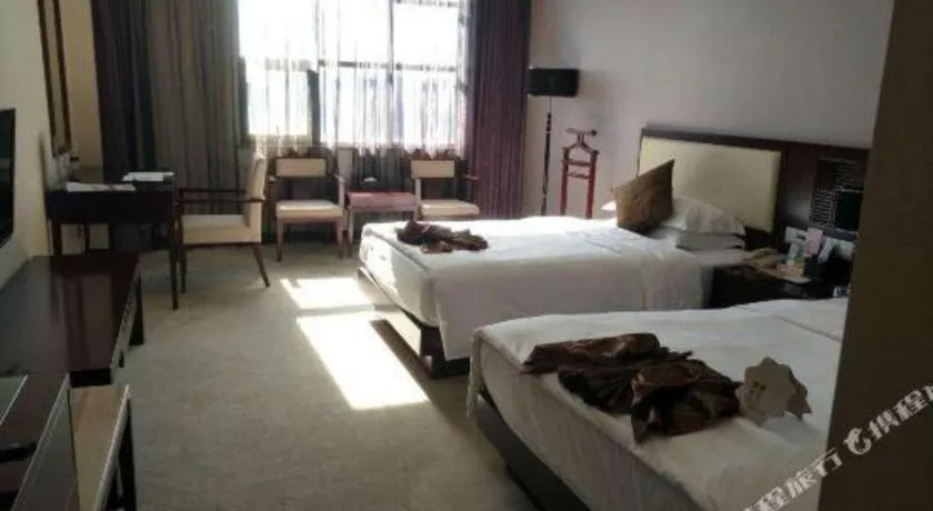 Bed in Kunming Wenhui Hotel