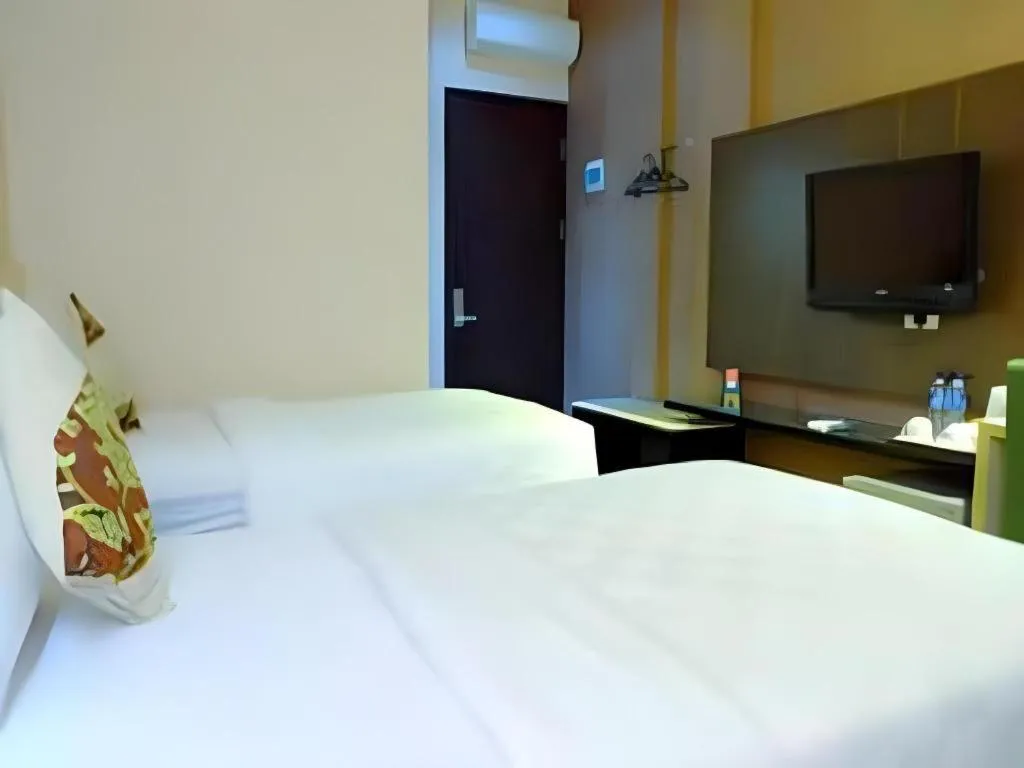 Bed in Lotus Hotel Subang