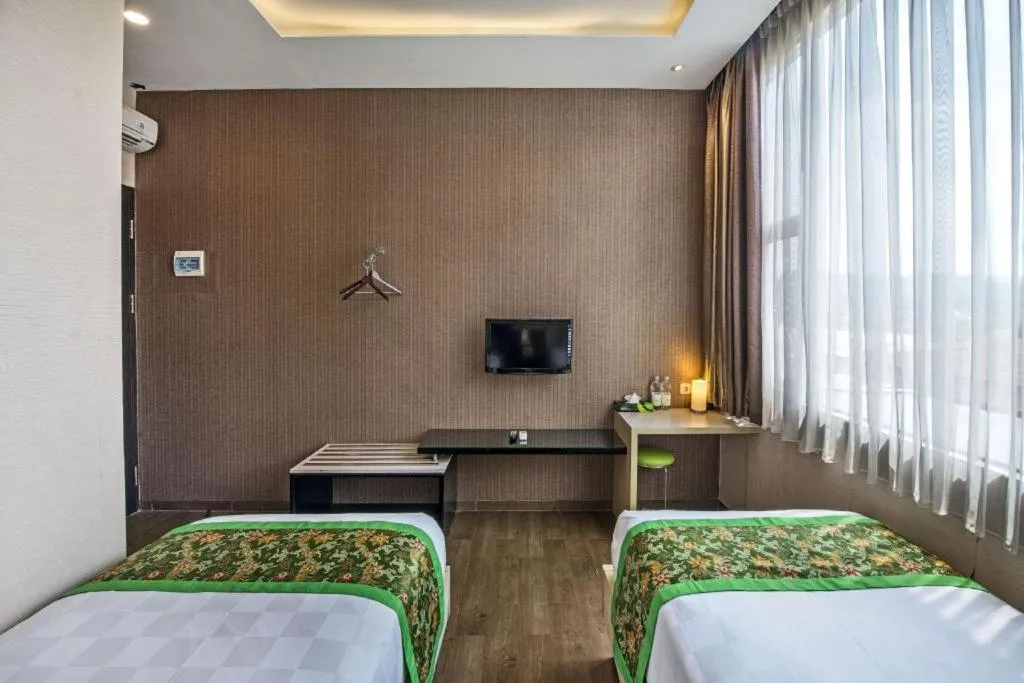 Bed in Lotus Hotel Subang