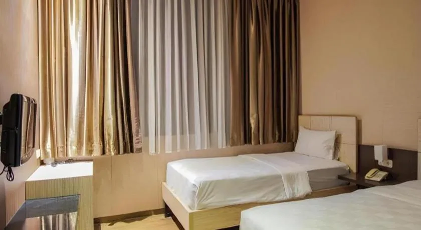 Bed in Lotus Hotel Subang