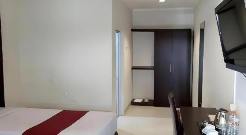 Bed in The Margangsa Hotel