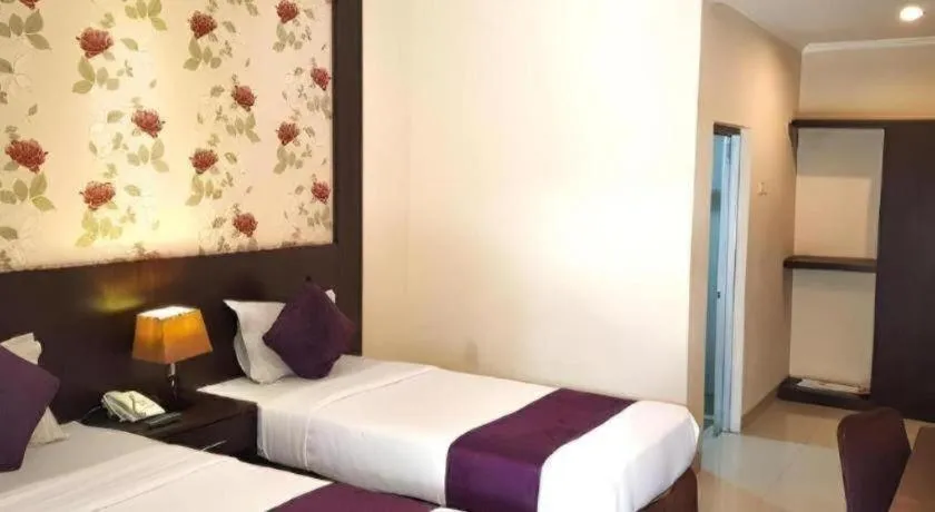 Bed in The Margangsa Hotel