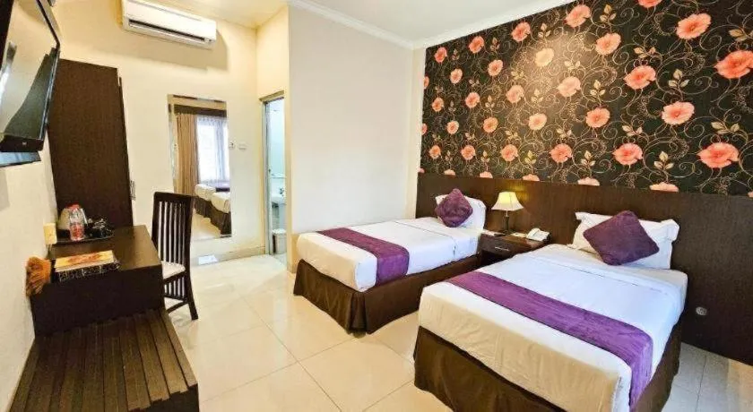 Bed in The Margangsa Hotel