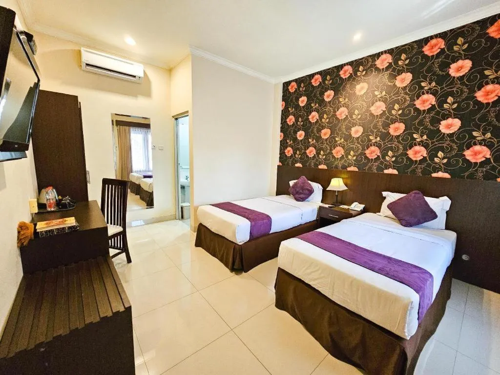 Bed in The Margangsa Hotel