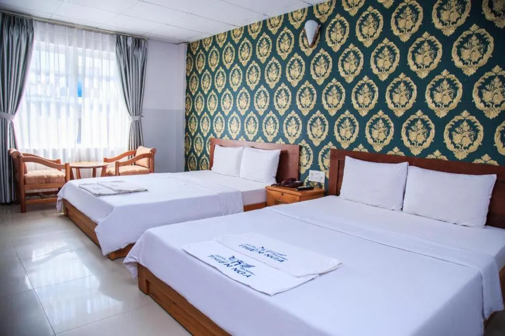 Bed in Thien Nga Family Hotel