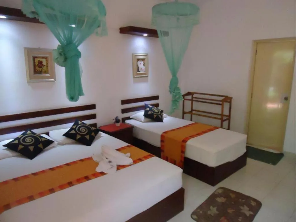 Bed in Seven Flowers Hotel