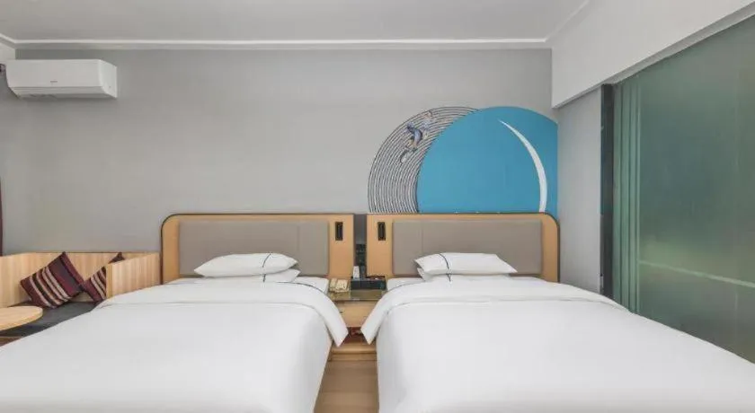 Bed in City Comfort Inn Yongzhou Jinshuiwan
