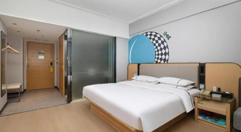 Bed in City Comfort Inn Yongzhou Jinshuiwan