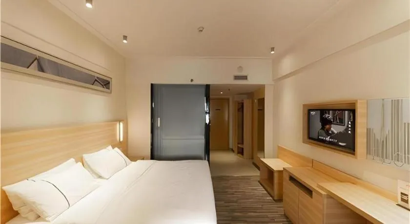 Bed in City Comfort Inn Yongzhou Jinshuiwan