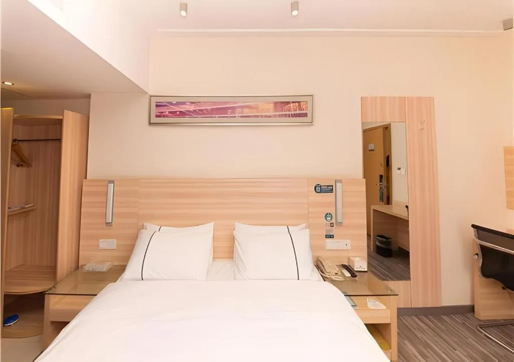 Bed in City Comfort Inn Yongzhou Jinshuiwan