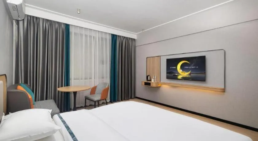 Bed in City Comfort Inn Yongzhou Jinshuiwan