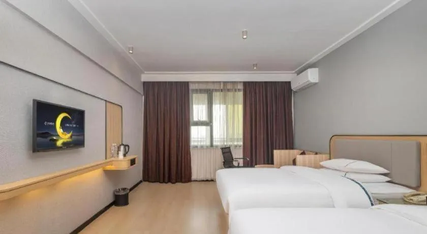Bed in City Comfort Inn Yongzhou Jinshuiwan