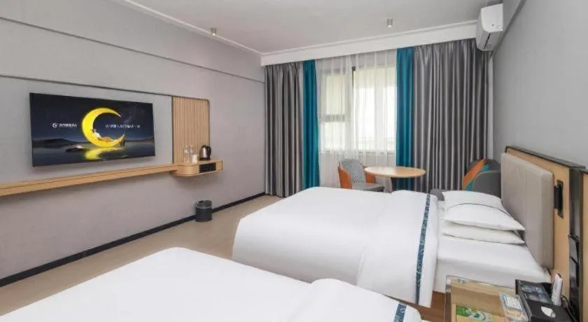 Bed in City Comfort Inn Yongzhou Jinshuiwan