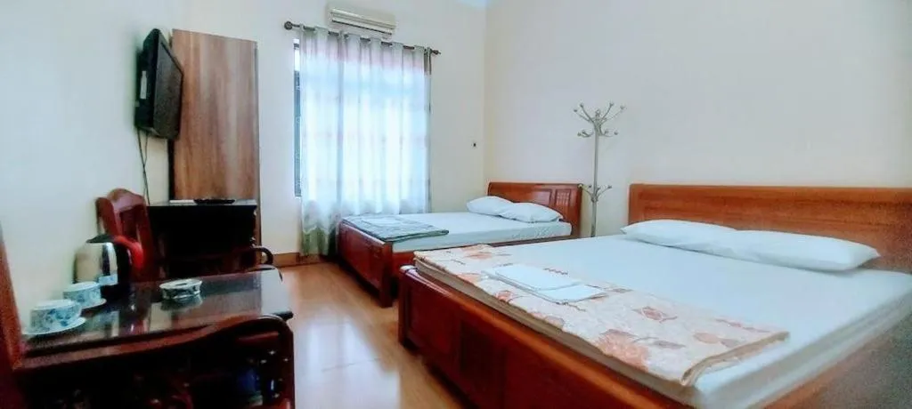 Bed in Linh Dan Hotel