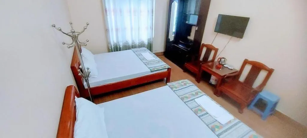 Bed in Linh Dan Hotel